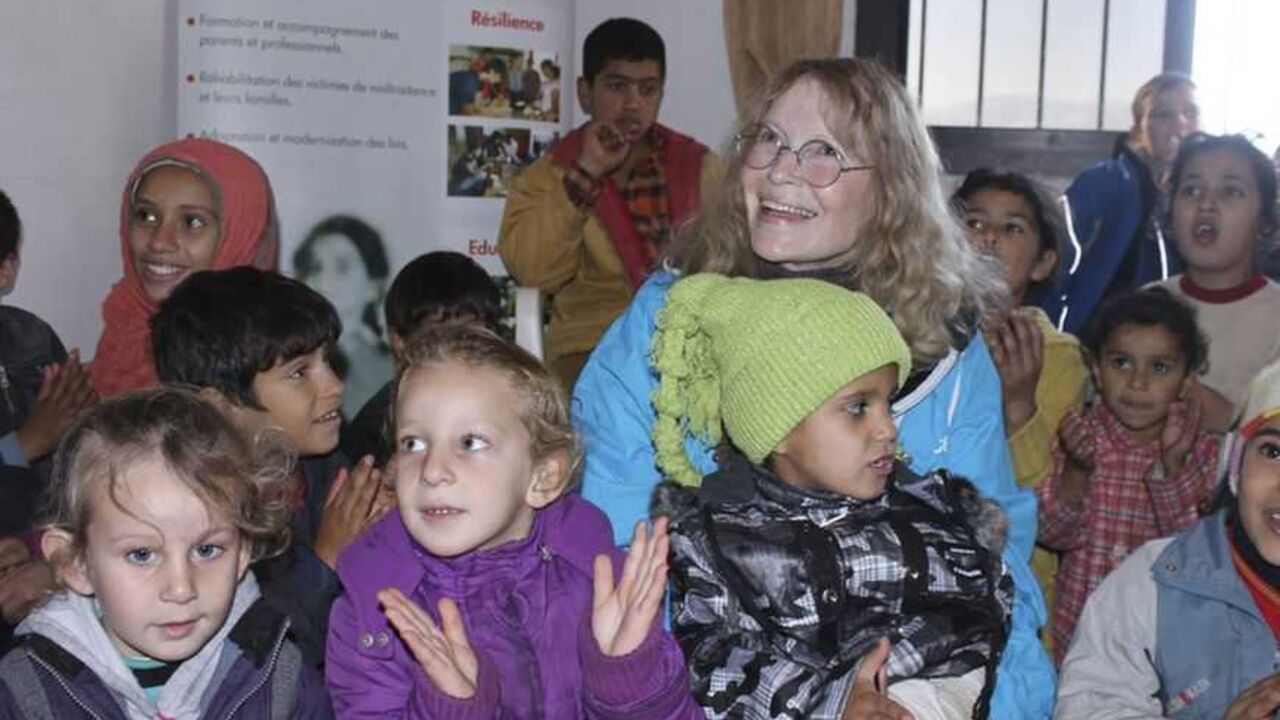 U.S. actress Farrow, a UNICEF goodwill ambassador, sits with children of Syrian refugees at an UNICEF office in Wadi Khaled, north Lebanon U.S. actress Mia Farrow (C), a UNICEF goodwill ambassador, sits with children of Syrian refugees at an UNICEF office in Wadi Khaled, north Lebanon, January 14, 2013. Farrow is on a two day visit to Lebanon, meeting Syrian refugees. REUTERS/Roula Naeimeh (LEBANON - Tags: SOCIETY POLITICS ENTERTAINMENT)