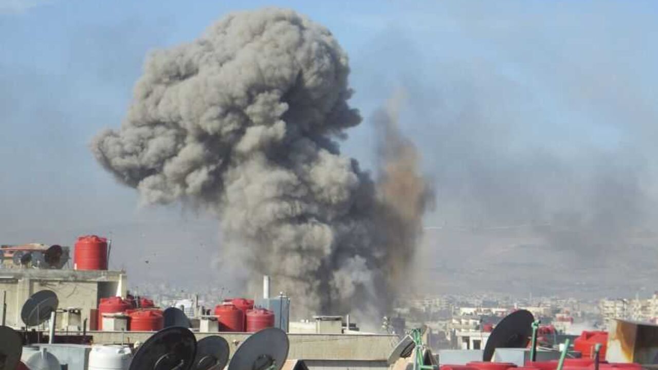 Smoke rises after what activists said were missiles fired by a Syrian Air Force fighter jet loyal to President al-Assad in Daraya Smoke rises after what activists said were missiles fired by a Syrian Air Force fighter jet loyal to President Bashar al-Assad in Daraya in this picture provided by Shaam News Network January 16, 2013. REUTERS/Kenan Al-Derani/Shaam News Network/Handout (SYRIA - Tags: POLITICS CIVIL UNREST)
ATTENTION EDITORS - THIS PICTURE WAS PROVIDED BY A THIRD PARTY. REUTERS IS UNABLE TO INDEPENDENTLY VERIFY THE AUTHENTICITY, CONTENT, LOCATION OR DATE OF THIS IMAGE. FOR EDITORIAL USE ONLY. NOT FOR SALE FOR MARKETING