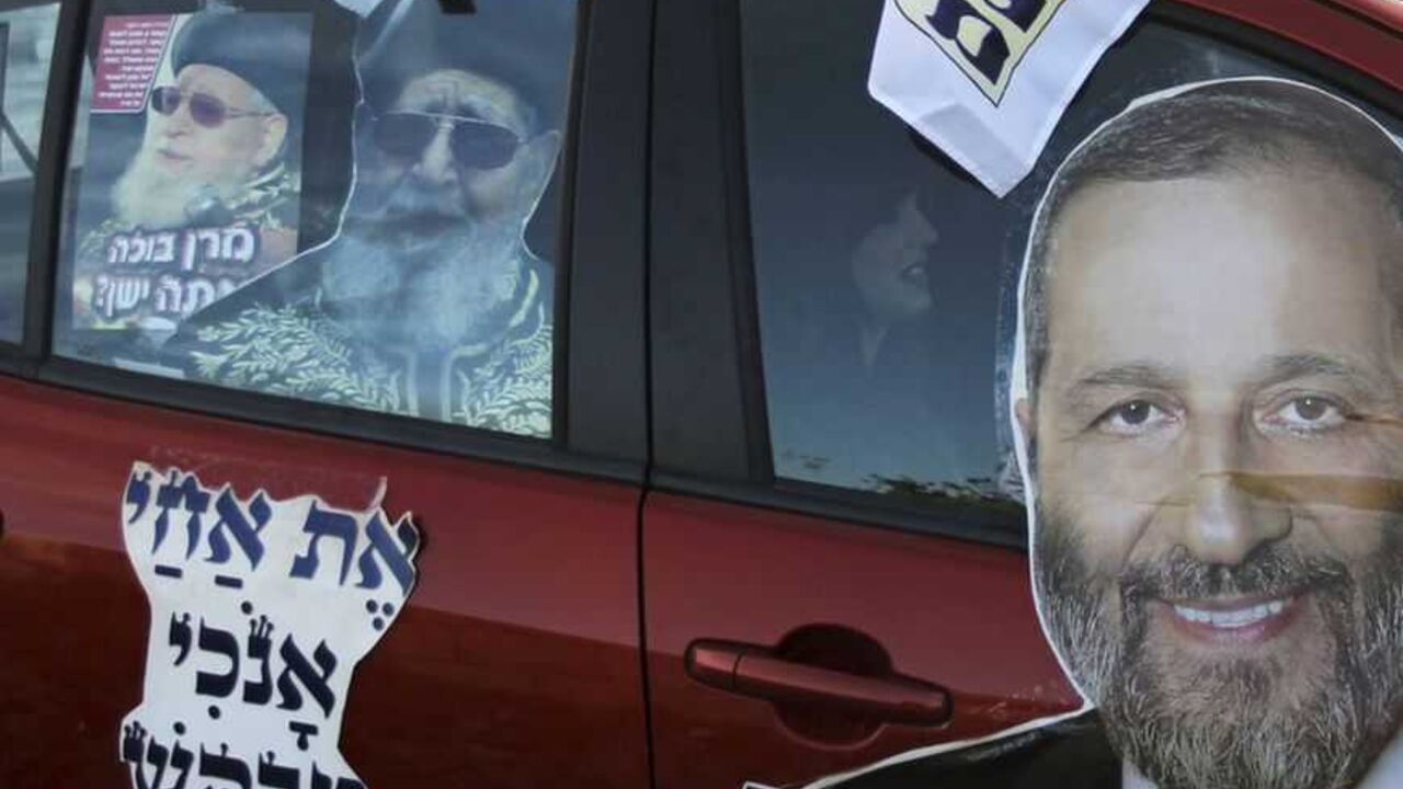 Ultra-Orthodox Shas party campaign stickers depicting party leader Deri and spiritual leader Rabbi Yosef are seen on a car in Jerusalem Ultra-Orthodox Shas party campaign stickers depicting party leader Aryeh Deri (R) and spiritual leader, Rabbi Ovadia Yosef (L), are seen on a car in Jerusalem January 17, 2013. A fixture in successive governments, Shas, the ultra-Orthodox party draws its support from the fast-growing community of religious Jews of Middle Eastern origin whose spiritual leader is the 92-year-old, Iraqi-born rabbi Ovadia Yosef. According to opinion polls, it will maintain its 11 seats in parliament. REUTERS/Ammar Awad (JERUSAL