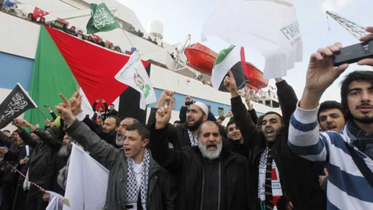 Supporters of Hamas' Gaza leader Ismail Haniyeh shout slogans against Israel in front of the cruise liner Mavi Marmara in Istanbul Supporters of Hamas' Gaza leader Ismail Haniyeh shout slogans against Israel in front of the cruise liner Mavi Marmara in Istanbul January 2, 2012. REUTERS/Osman Orsal (TURKEY - Tags: POLITICS)