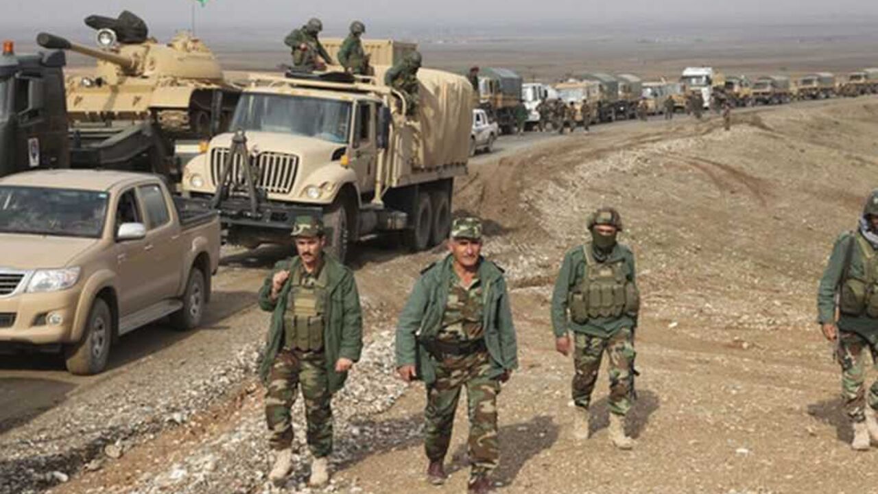 Kurdish Peshmerga troops are deployed on the outskirts of Kirkuk Kurdish Peshmerga troops are deployed on the outskirts of Kirkuk, some 250km (155 miles) north of Baghdad, November 24, 2012. Iraq's Kurdish region has sent reinforcements to a disputed area where its troops are involved in a standoff with the Iraqi army, a senior Kurdish military official said, despite calls on both sides for dialogue to calm the situation. Picture taken November 24, 2012. REUTERS/Azad Lashkari (IRAQ - Tags: CONFLICT POLITICS MILITARY)