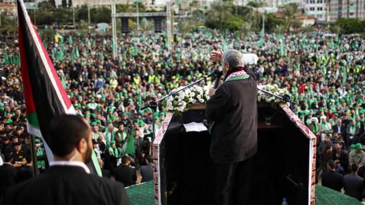 Hamas chief Meshaal gives a speech during a rally marking the 25th anniversary of the founding of Hamas in Gaza City Hamas chief Khaled Meshaal gives a speech during a rally marking the 25th anniversary of the founding of Hamas, in Gaza City December 8, 2012. Meshaal, in an uncompromising speech during his first ever visit to Gaza after decades of exile, told a mass rally on Saturday he would never recognise Israel and pledged to "free the land of Palestine inch by inch". REUTERS/Ahmed Jadallah (GAZA - Tags: POLITICS ANNIVERSARY CIVIL UNREST)