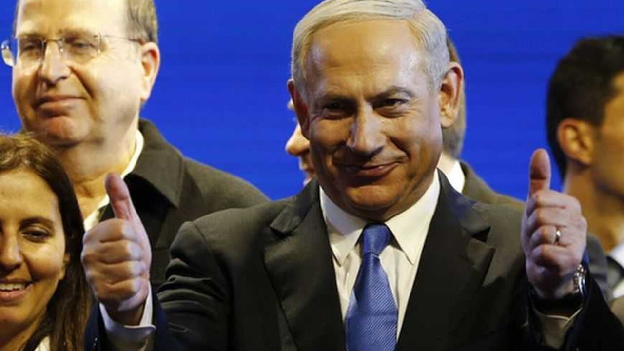 Israel's Prime Minister Netanyahu is seen during the launch of his Likud Beiteinu party campaign in Jerusalem Israel's Prime Minister Benjamin Netanyahu (C) is seen during the launch of his Likud Beiteinu party campaign ahead of the upcoming January 22 national elections, in Jerusalem December 25, 2012. REUTERS/Ronen Zvulun (JERUSALEM - Tags: POLITICS ELECTIONS)