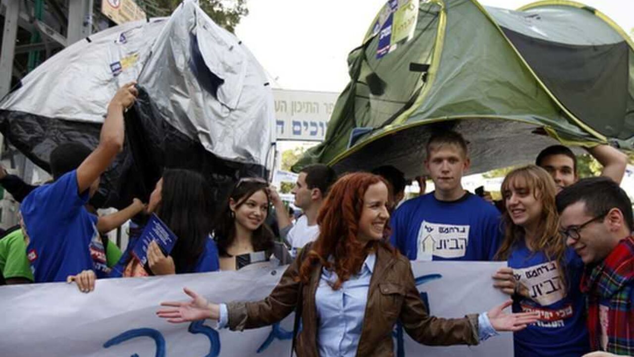 Labour party candidate Shaffir stands with supporters near Tel Aviv Labour party candidate Stav Shaffir (C) stands with supporters during a mock election at a high school in Ramat Gan near Tel Aviv December 6, 2012. The leaders of a grassroots social protest movement that swept Israel in 2011, one of them Shaffir, have shot to the top of a rejuvenated Labour party that polls say will at least double its power in a Jan. 22 general election that Prime Minister Benjamin Netanyahu's right-wing Likud is forecast to win. Picture taken December 6, 2012. REUTERS/Amir Cohen (ISRAEL