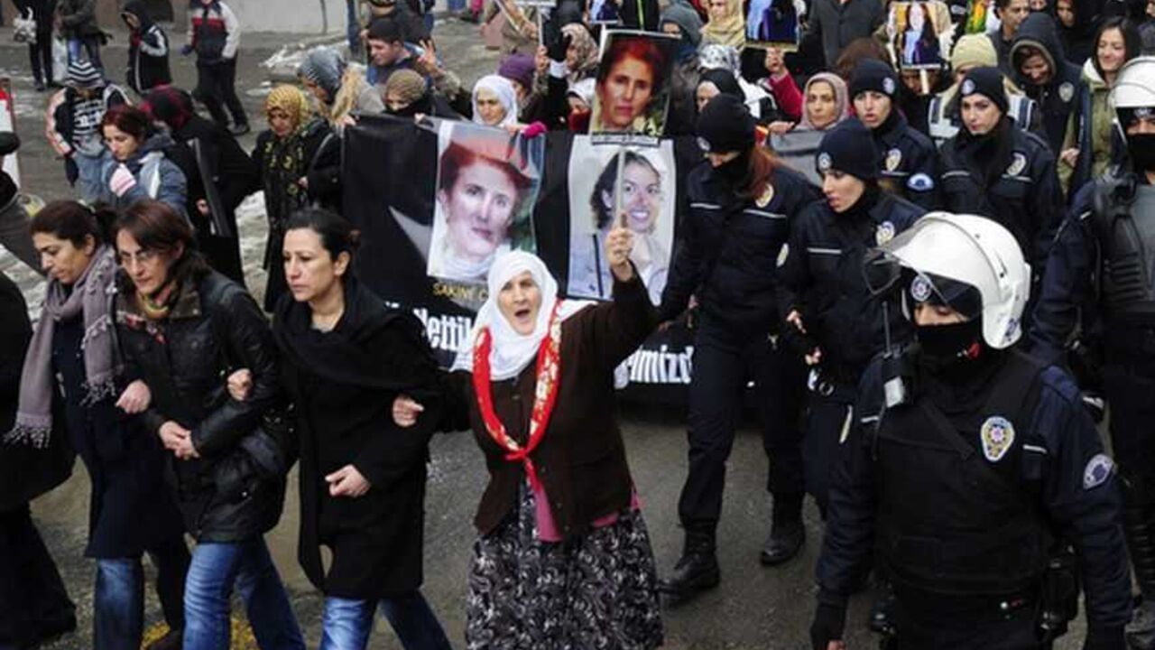 Turkish Kurdish demonstrators march with pictures of slain Kurdish activists during a protest in Diyarbakir Turkish Kurdish demonstrators march with pictures of slain Kurdish activists during a protest in Diyarbakir, southeastern Turkey, January 12, 2013. Three female Kurdish activists, including a founding member of the PKK rebel group, were found shot dead in Paris on Thursday, in execution-style killings condemned by Turkish politicians trying to broker a peace deal. REUTERS/Stringer (TURKEY - Tags: POLITICS CRIME LAW CIVIL UNREST)