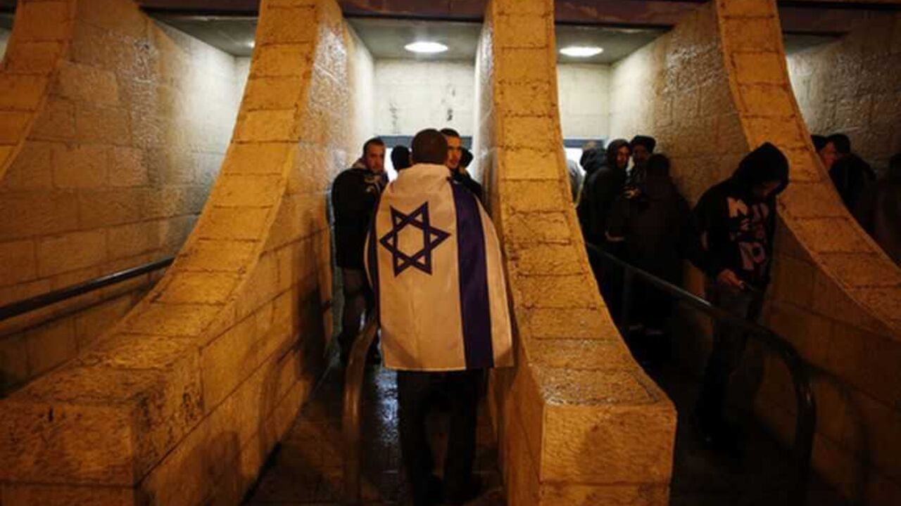 A supporter of Beitar Jerusalem enters the stadium before a soccer match against Maccabi Umm el-Fahm in Jerusalem A supporter of Beitar Jerusalem enters the stadium before a soccer match against Maccabi Umm el-Fahm at Teddy Stadium in Jerusalem January 29, 2013. Hundreds of police officers and stewards secured the Israeli State Cup match on Tuesday in which Premier League Beitar Jerusalem, supported by a group of vehement anti-Arab fans, host Arab side Maccabi Umm el-Fahm. A racist element among Beitar fans caused uproar in the Jewish state on Saturday when they held up banners during a Premier League match to protest