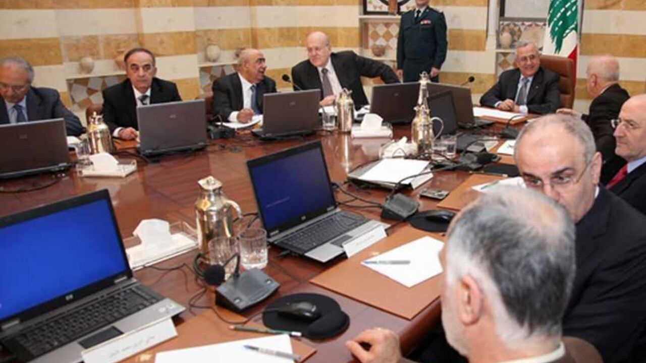 SYRIA-CRISIS/LEBANON-REFUGEES Lebanon's President Michel Suleiman (5th from bottom) presides a cabinet meeting at the presidential palace in Baabda, near Beirut January 3, 2013. Lebanon, now a haven for 170,000 Syrians fleeing civil war, has asked foreign donors for $180 million to help care for them and said it will register and recognise refugees after a year-long hiatus. The Beirut government has officially sought to "dissociate" itself from the 21-month-old struggle in Syria, nervous about the destabilising impact of the increasingl