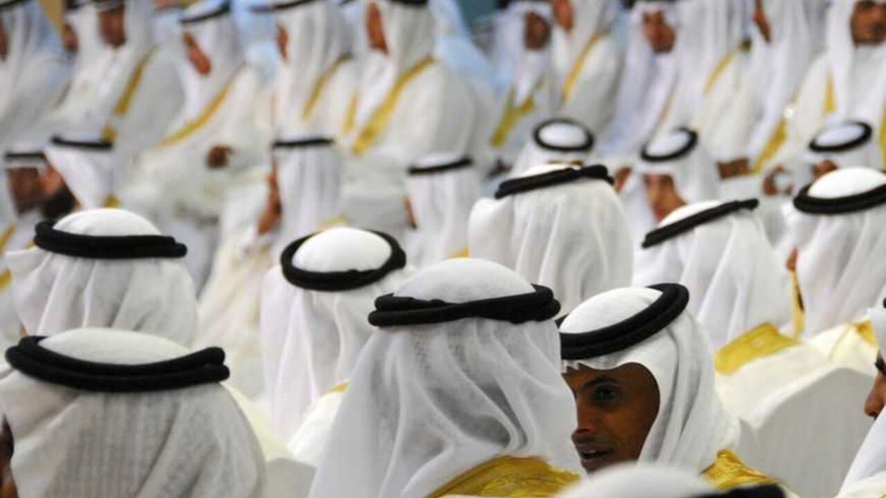 Grooms take part in a mass wedding ceremony in Tabuk Grooms take part in a mass wedding ceremony in Tabuk, 1500 km (932 miles) from Riyadh, May 2, 2012. Governor of Tabuk Prince Fahad Bin Sultan bin Abdul-Aziz and a local group organised the mass wedding for about 1600 couples to help youths who are unable to afford expensive ceremonies because of the rising cost of living. REUTERS/Mohamed Alhwaity (SAUDI ARABIA - Tags: SOCIETY) - RTR31J79