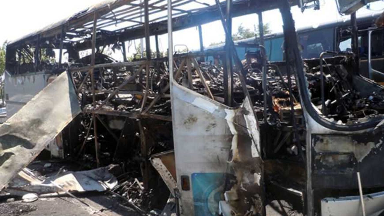 A bus, that was damaged in a bomb blast on Wednesday is seen outside Burgas Airport A bus, that was damaged in a bomb blast on Wednesday is seen outside Burgas Airport, about 400km (248 miles) east of Sofia July 19, 2012. A suicide bomber carried out an attack that killed seven people in a bus transporting Israeli tourists in Bulgaria, the country's interior minister said on Thursday, and Israel said Iranian-backed Hezbollah militants were to blame. Video surveillance footage showed the bomber was similar in appearance to tourists arriving at the airport, Interior Minister Tsvetan Tsvetano