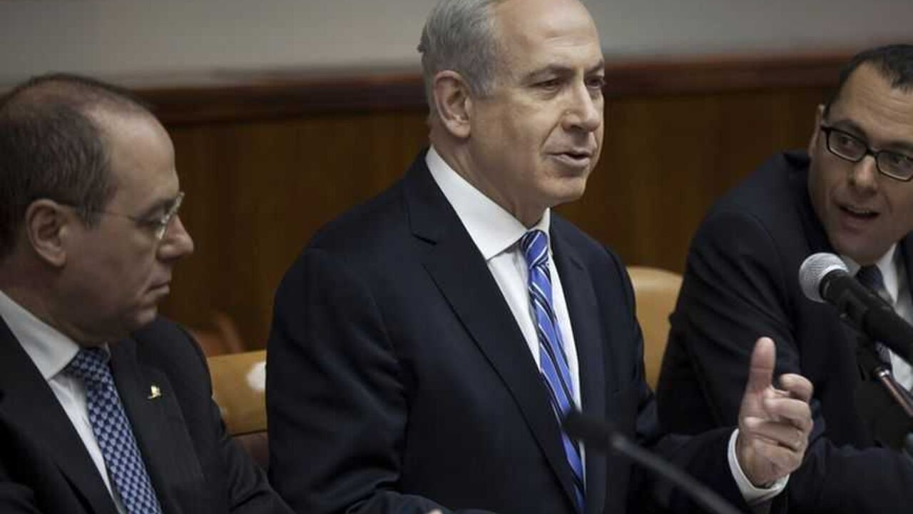 Israel's PM Netanyahu attends the weekly cabinet meeting in Jerusalem Israel's Prime Minister Benjamin Netanyahu (C) attends the weekly cabinet meeting in Jerusalem February 10, 2013. Iran's nuclear ambitions, the civil war in Syria and stalled Israeli-Palestinian peace efforts will top the agenda of U.S. President Barack Obama's visit to Israel, Netanyahu said on Sunday. REUTERS/Uriel Sinai/Pool (JERUSALEM - Tags: POLITICS) - RTR3DKNE