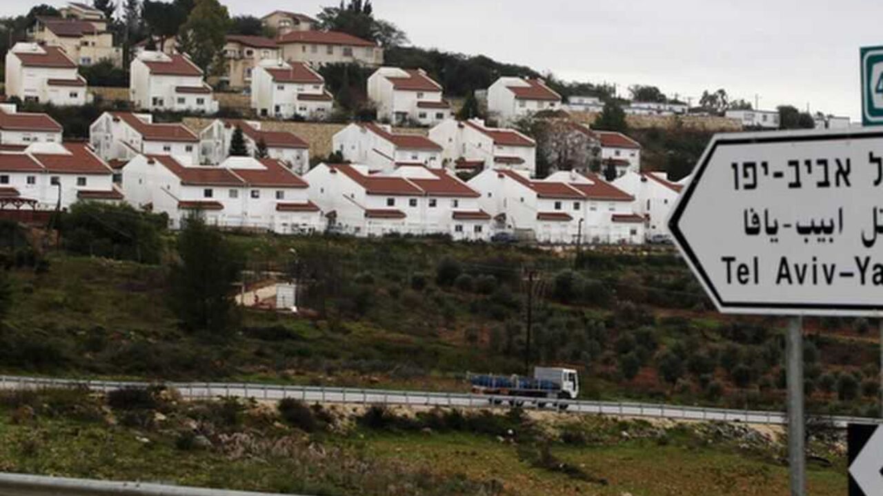 Houses in the Jewish settlement of Halamish are seen from a road near West Bank city of Ramallah Houses in the Jewish settlement of Halamish are seen from a road near West Bank city of Ramallah February 1, 2013. U.N. human rights investigators called on Israel on Thursday to halt settlement expansion and withdraw all half a million Jewish settlers from the occupied West Bank, saying that its practices could be subject to prosecution as possible war crimes. REUTERS/Baz Ratner (WEST BANK - Tags: POLITICS BUSINESS CONSTRUCTION) - RTR3D82O