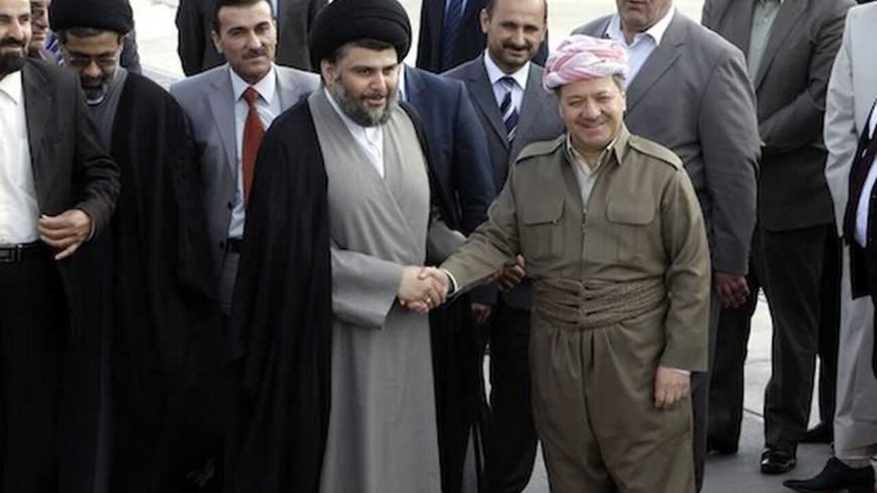 Iraqi Kurdish regional President Masoud Barzani welcomes Iraqi Shi'ite cleric Moqtada al-Sadr at Arbil Iraqi Kurdish regional President Masoud Barzani (R) welcomes Iraqi Shi'ite cleric Moqtada al-Sadr at Arbil's airport, about 350 km (220 miles) north of Baghdad April 26, 2012. REUTERS/Azad Lashkari (IRAQ - Tags: POLITICS) - RTR3194S