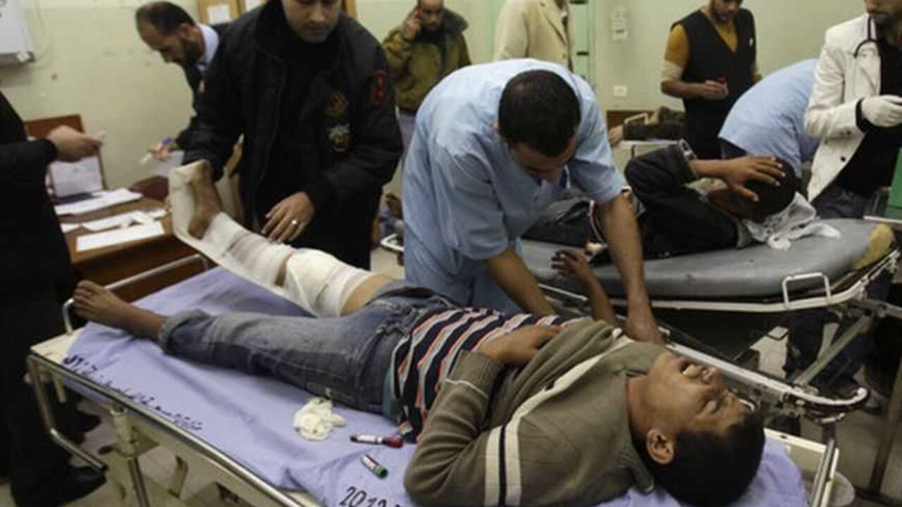 Wounded Palestinian is treated at a hospital in Khan Younis A wounded Palestinian is treated at a hospital in Khan Younis in the southern Gaza Strip November 23, 2012. Israeli gunfire at the Gaza border killed one Palestinian on Friday and wounded several others, medics said, two days after a ceasefire between the territory's Islamist rulers Hamas and Israel took hold. REUTERS/ Ibraheem Abu Mustafa (GAZA - Tags: CIVIL UNREST MILITARY POLITICS CONFLICT) - RTR3AS3Q