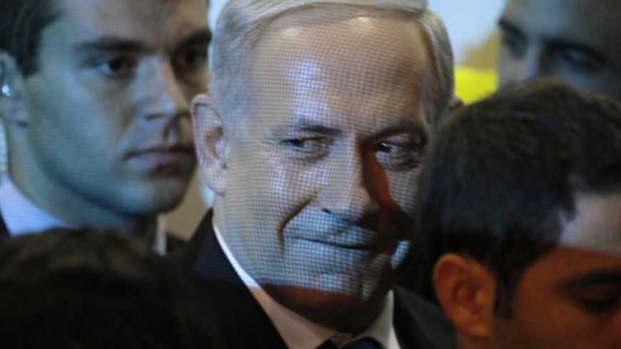 Israel's Prime Minister Netanyahu leaves the Likud-Yisrael Beitenu headquarters in Tel Aviv Israel's Prime Minister Benjamin Netanyahu (C) leaves the Likud-Yisrael Beitenu headquarters in Tel Aviv January 23, 2013. Hawkish Prime Minister Netanyahu emerged the bruised winner of Israel's election on Tuesday, claiming victory despite unexpected losses to resurgent centre-left challengers. REUTERS/Nir Elias (ISRAEL - Tags: POLITICS ELECTIONS TPX IMAGES OF THE DAY) - RTR3CTC8