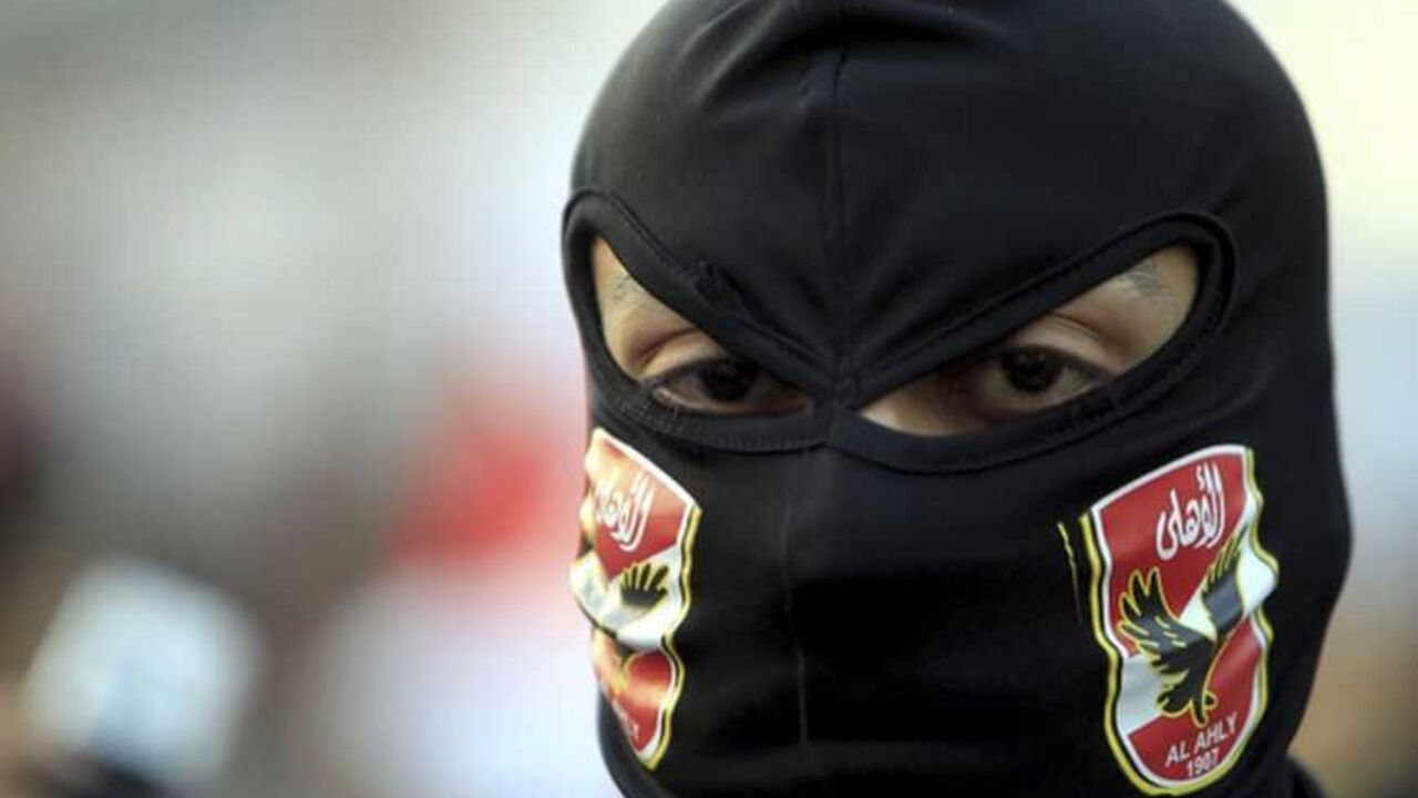 A member of the Black Bloc is seen during the protest in Tahrir Square in Cairo A member of the Black Bloc is seen during the protest in Tahrir Square in Cairo January 25, 2013. Egypt marks the second anniversary of the uprising that swept Hosni Mubarak from power with little to celebrate. Deeply divided and facing an economic crisis, the nation is bracing for more protests, but this time against a freely elected leader.REUTERS/Mohamed Abd El Ghany (EGYPT - Tags: POLITICS CIVIL UNREST) - RTR3CY9J