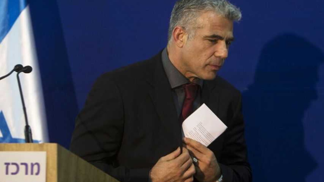 Lapid, leader of the Yesh Atid party, leaves the podium after delivering a statement to the media in Jerusalem Yair Lapid, leader of the Yesh Atid (There's a Future) party, leaves the podium after delivering a statement to the media, following his meeting with Israel's President Shimon Peres (unseen) in Jerusalem January 30, 2013. Peres on Wednesday began consultations with political parties over the formation of a new coalition and appears certain to pick incumbent Prime Minister Benjamin Netanyahu to assemble it. Lapid's new centrist party stormed to second place in last week's election by winning 19 seats. REUTER