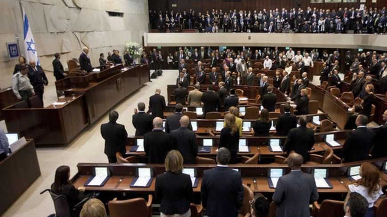 Members of the 19th Knesset stand as President Peres arrives to their swearing-in ceremony in Jerusalem Members of the 19th Knesset, the new Israeli parliament, stand as President Shimon Peres arrives to their swearing-in ceremony in Jerusalem February 5, 2013. REUTERS/Uriel Sinai/Pool (JERUSALEM - Tags: POLITICS) - RTR3DDXN