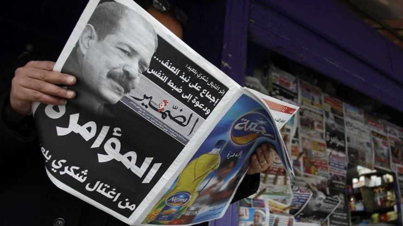 A man reads a local newspaper, displaying a picture of assassinated prominent Tunisian opposition politician Chokri Belaid, at a kiosk in Tunis A man reads a local newspaper, displaying a picture of assassinated prominent Tunisian opposition politician Chokri Belaid, at a kiosk in Tunis February 7, 2013. Tunisia's Islamists rejected on Thursday a plan by their party chief and prime minister to change the government after unrest erupted over the killing of an opposition leader, deepening the worst crisis since a 2011 revolution. Labour union leaders agreed to stage a general strike on Friday and the family of assassinated secular politician Chokri B