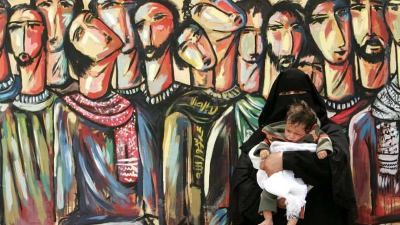 A Palestinian woman attends a protest calling for the release of Palestinian prisoners from Israeli jails, in Gaza Palestinian woman attends a protest calling for the release of Palestinian prisoners from Israeli jails, in Gaza April 16, 2007. REUTERS/Mohammed Salem (GAZA) - RTR1OOS7