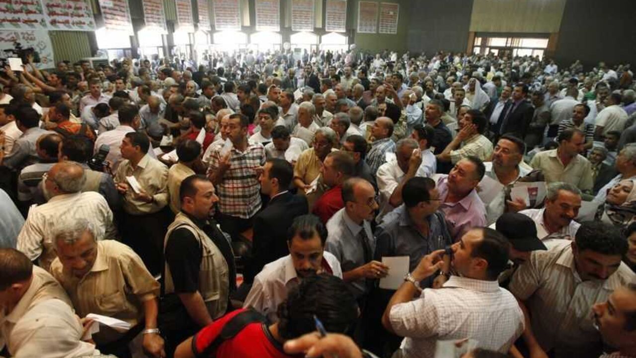 Iraqi journalists wait to vote during the Iraqi Journalists Syndicate elections in Baghdad Iraqi journalists wait to vote during the Iraqi Journalists Syndicate elections in Baghdad August 27, 2011. REUTERS/Thaier Al-Sudani (IRAQ - Tags: ELECTIONS POLITICS MEDIA) - RTR2QEKM
