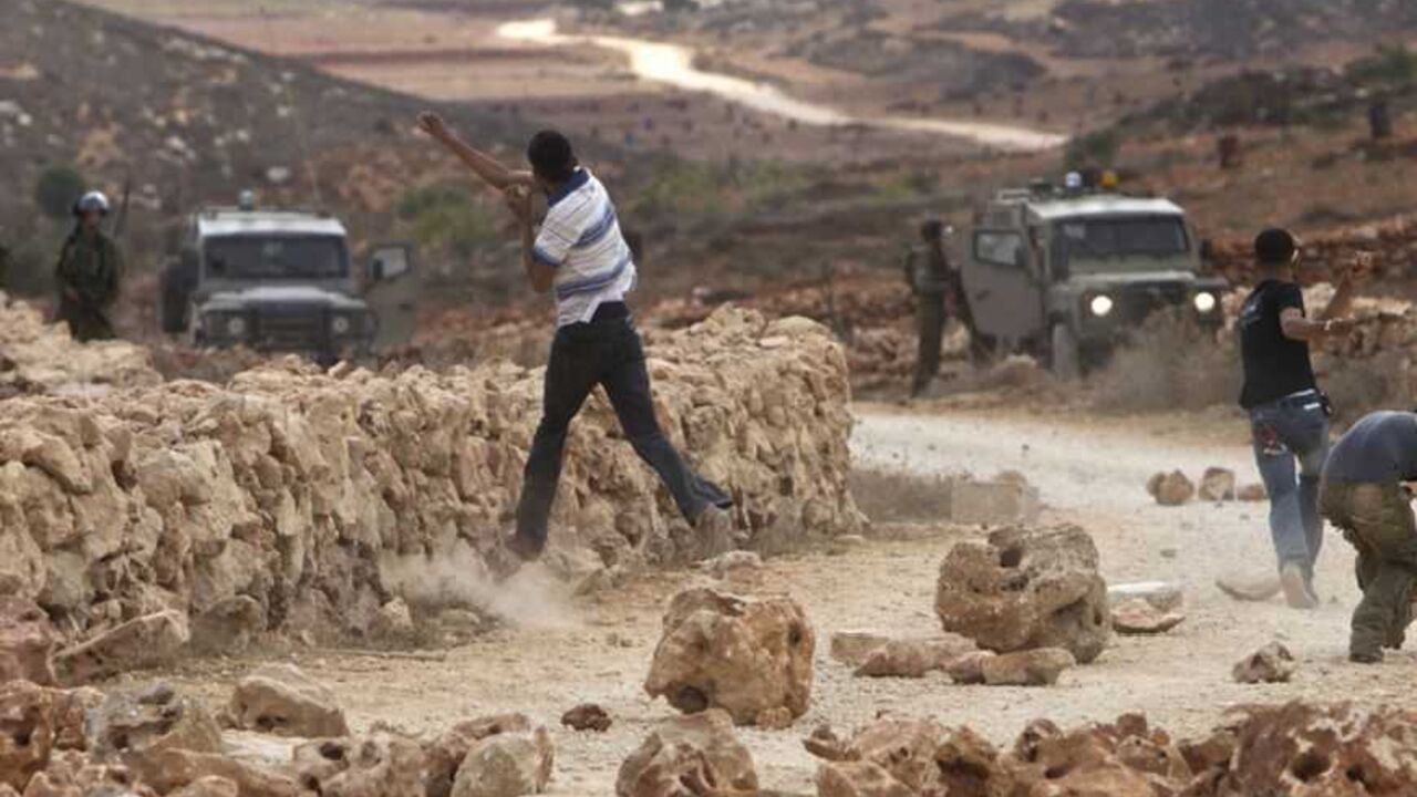 Palestinian protesters throw stones at Israeli soldiers during clashes in Qusra near Nablus Palestinian protesters throw stones at Israeli soldiers during clashes in the West Bank village of Qusra near Nablus September 23, 2011. Israeli security forces shot dead a Palestinian in the West Bank on Friday during a confrontation in his village with Jewish settlers, Palestinian officials said. Tensions have been growing between Palestinians and settlers who stake a biblical claim to the West Bank, as the Palestinian leadership prepared to seek full U.N. membership for a state partly on the Israeli-occu