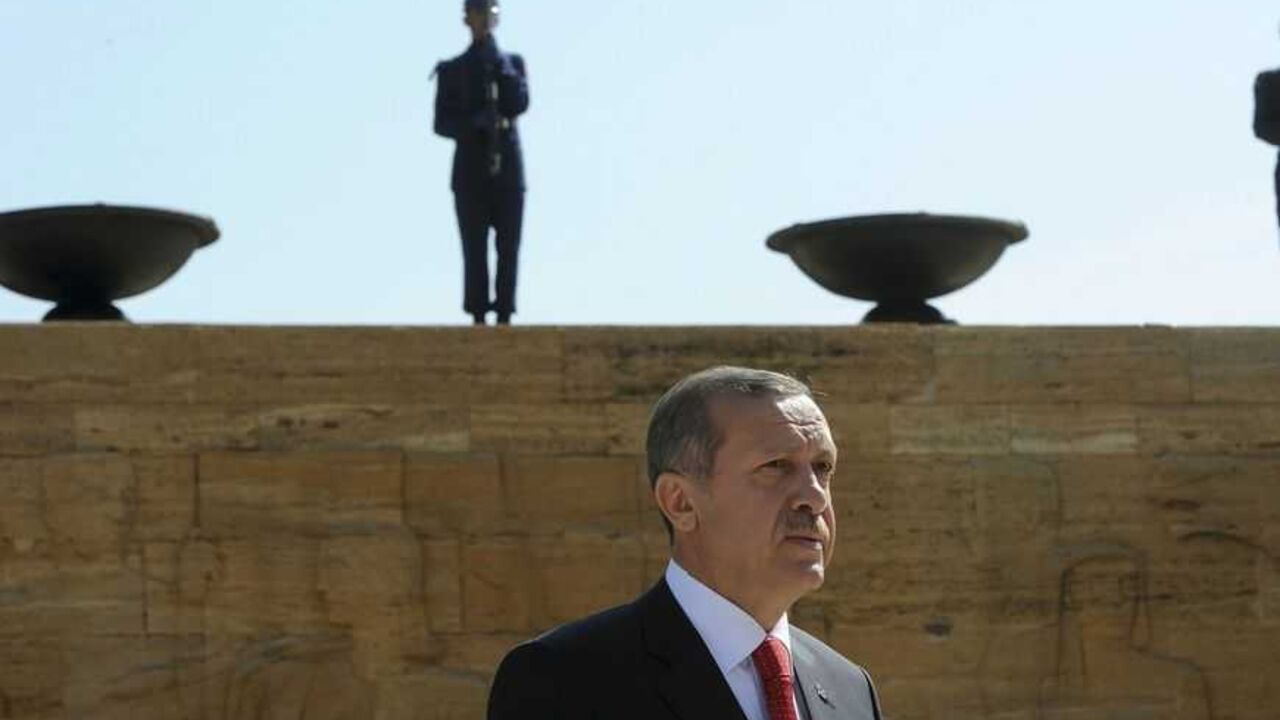 Turkey's Prime Minister Tayyip Erdogan leaves a wreath-laying ceremony at the mausoleum of Mustafa Kemal Ataturk in Ankara Turkey's Prime Minister Tayyip Erdogan leaves a wreath-laying ceremony at the mausoleum of Mustafa Kemal Ataturk, founder of modern Turkey, in Ankara August 1, 2012. REUTERS/Stringer (TURKEY - Tags: POLITICS MILITARY) - RTR35TGQ