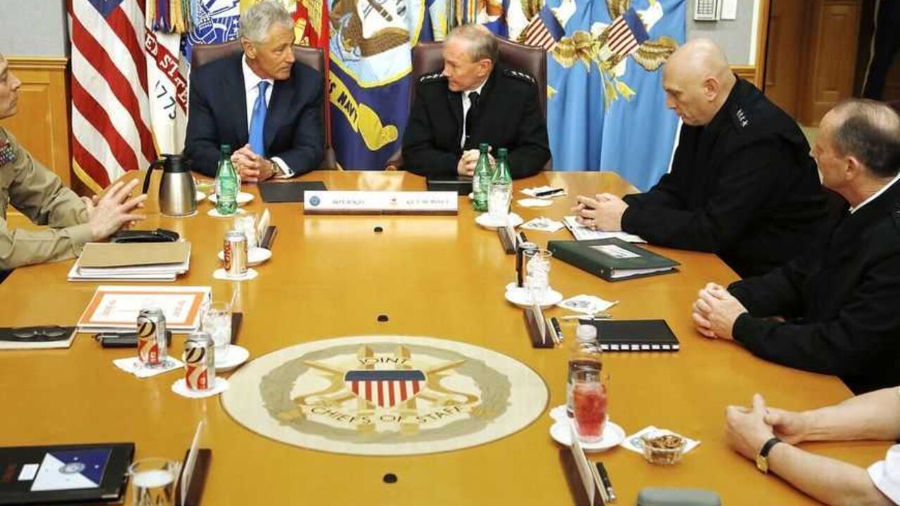Hagel holds his first meeting with the Joint Chiefs of Staff in a briefing room at the Pentagon in Arlington, Virginia U.S. Secretary of Defense Chuck Hagel (2nd L) holds his first meeting with the Joint Chiefs of Staff U.S. Marine Corps Commandant General John M. Paxton, Jr. (L), U.S. Army General Martin Dempsey (4th R), General of the Army Ray Odierno (3rd R), U.S. Navy Chief of Naval Operations Admiral Jon Greenert (2nd R) and U.S. Army General Frank Grass (R) in a briefing room called "The Tank" at the Pentagon in Arlington, Virginia, March 1, 2013. REUTERS/Jonathan Ernst (UNITED STATES - Tags: POLITICS MILITARY) -