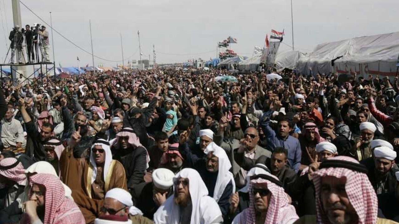 Sunni Muslims chant during an anti-government demonstration in Ramadi Sunni Muslims chant "Allahu Akbar", meaning God is great, during an anti-government demonstration in Ramadi, 100 km (62 miles) west of Baghdad, March 8, 2013.Thousands of Sunni Muslims protested after Friday prayers in huge rallies against Shi'ite Iraqi Prime Minister Nuri al-Maliki, demanding that he step down. REUTERS/Ali al-Mashhadani (IRAQ - Tags: CIVIL UNREST POLITICS RELIGION) - RTR3EQ8A