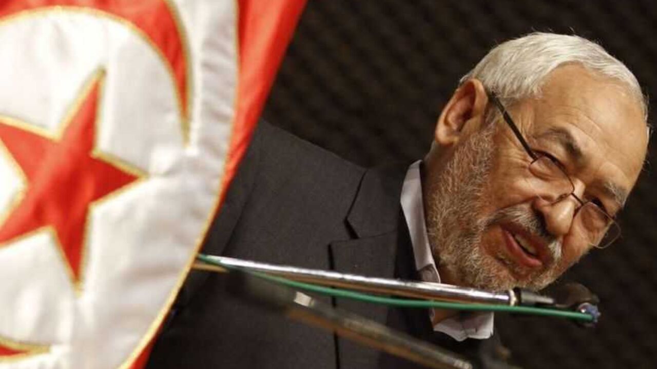 Rached Ghannouchi, leader of the Islamist Ennahda movement, Tunisia's main Islamist political party, delivers a speech during a meeting regarding International Women's Day in Tunis Rached Ghannouchi, leader of the Islamist Ennahda movement, Tunisia's main Islamist political party, delivers a speech during a meeting regarding International Women's Day in Tunis March 10, 2013. International Women's Day fell on March 8. REUTERS/Zoubeir Souissi (TUNISIA - Tags: POLITICS SOCIETY) - RTR3ETM2