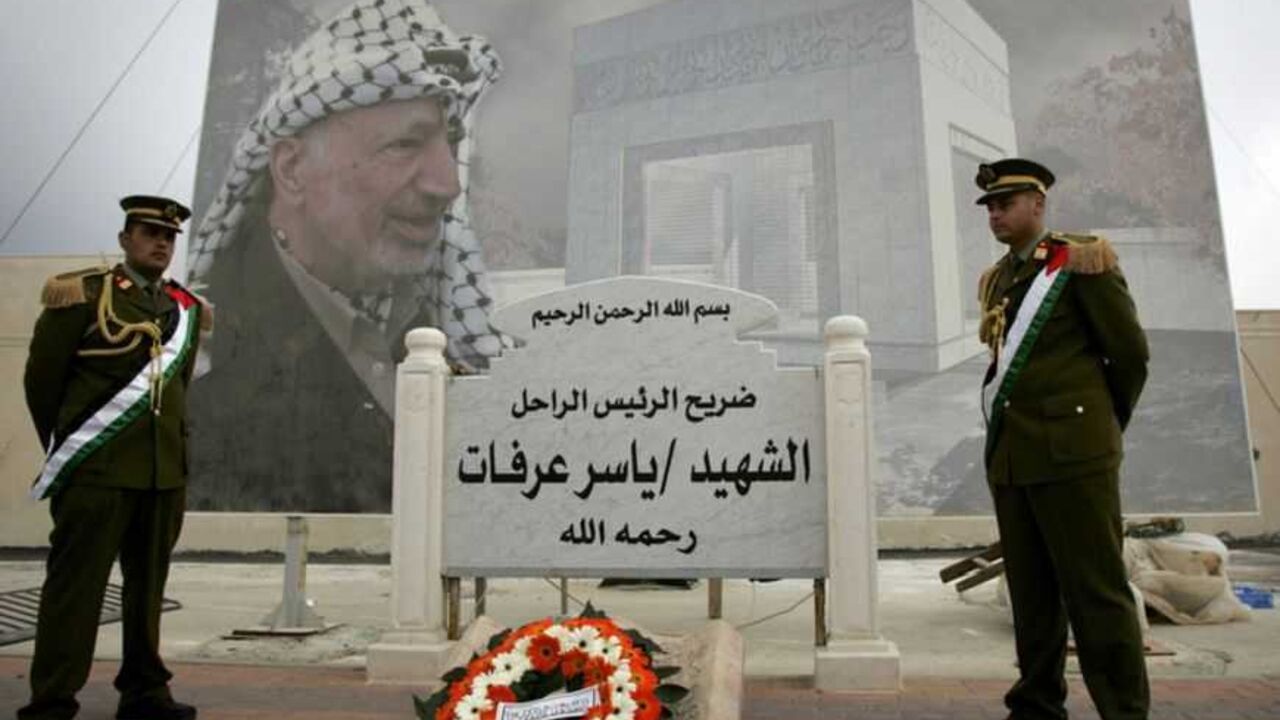 Members of Palestinian security forces stand guard in Ramallah Members of the Palestinian security forces stand guard by the burial site of Palestinian leader Yasser Arafat in the West Bank city of Ramallah November 7, 2007. November 11 marks the anniversary of Arafat's death. REUTERS/Loay Abu Haykel (WEST BANK) - RTX2EI