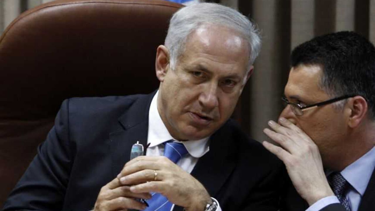 Israel's Likud party leader Netanyahu listens to Sa'ar, a member of the Knesset, during a party meeting at the Israeli parliament in Jerusalem Israel's Likud party leader Benjamin Netanyahu listens to Gideon Sa'ar, a member of the Knesset, during a party meeting at the Israeli parliament in Jerusalem February 11, 2009. Israel headed for political gridlock on Wednesday with both Foreign Minister Tzipi Livni's centrist Kadima party and Netanyahu's right-wing Likud party declaring victory in an election that left the prospect of Israel and the Palestinians making peace as distant as ever. REUTERS/Baz Ratner (JERUSALEM) - RTXBIAC