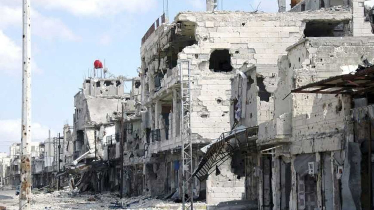 A view is seen of damaged buildings at Baba Amro neighborhood in Homs city, after clashes between forces loyal to Syrian President Bashar al-Assad and fighters of the Free Syrian Army A view is seen of damaged buildings at Baba Amro neighborhood in Homs city, after clashes between forces loyal to Syrian President Bashar al-Assad and fighters of the Free Syrian Army, is seen in this handout photograph distributed by Syria's national news agency SANA March 27, 2013. REUTERS/SANA/Handout (SYRIA - Tags: CONFLICT CIVIL UNREST RELIGION) ATTENTION EDITORS - THIS IMAGE WAS PROVIDED BY A THIRD PARTY. THIS PICTURE IS DISTRIBUTED EXACTLY AS RECEIVED BY REUTERS, AS A SERVICE TO CLIENTS. FOR EDITORIA