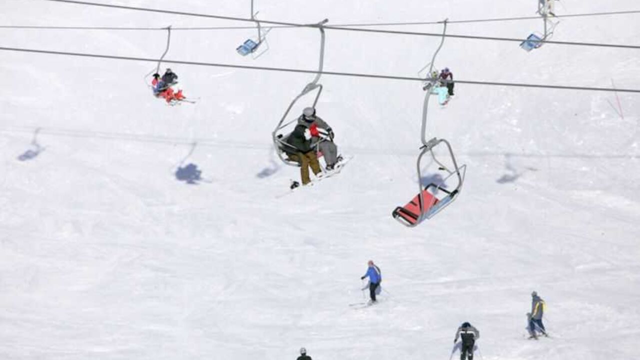 Snow boarders ride a ski lift on Mount Hermon in the Golan Heights near the Israel-Syria border Snow boarders ride a ski lift on Mount Hermon in the Golan Heights near the Israel-Syria border February 7, 2010. The Golan Heights form a strategic plateau between Israel and Syria of about 1,200 square kilometers (460 square miles). Israel captured it in the 1967 Middle East war and annexed it in 1981 in a move not recognized internationally.
REUTERS/Darren Whiteside (ISRAEL - Tags: ENVIRONMENT TRAVEL SOCIETY) - RTR29XGT