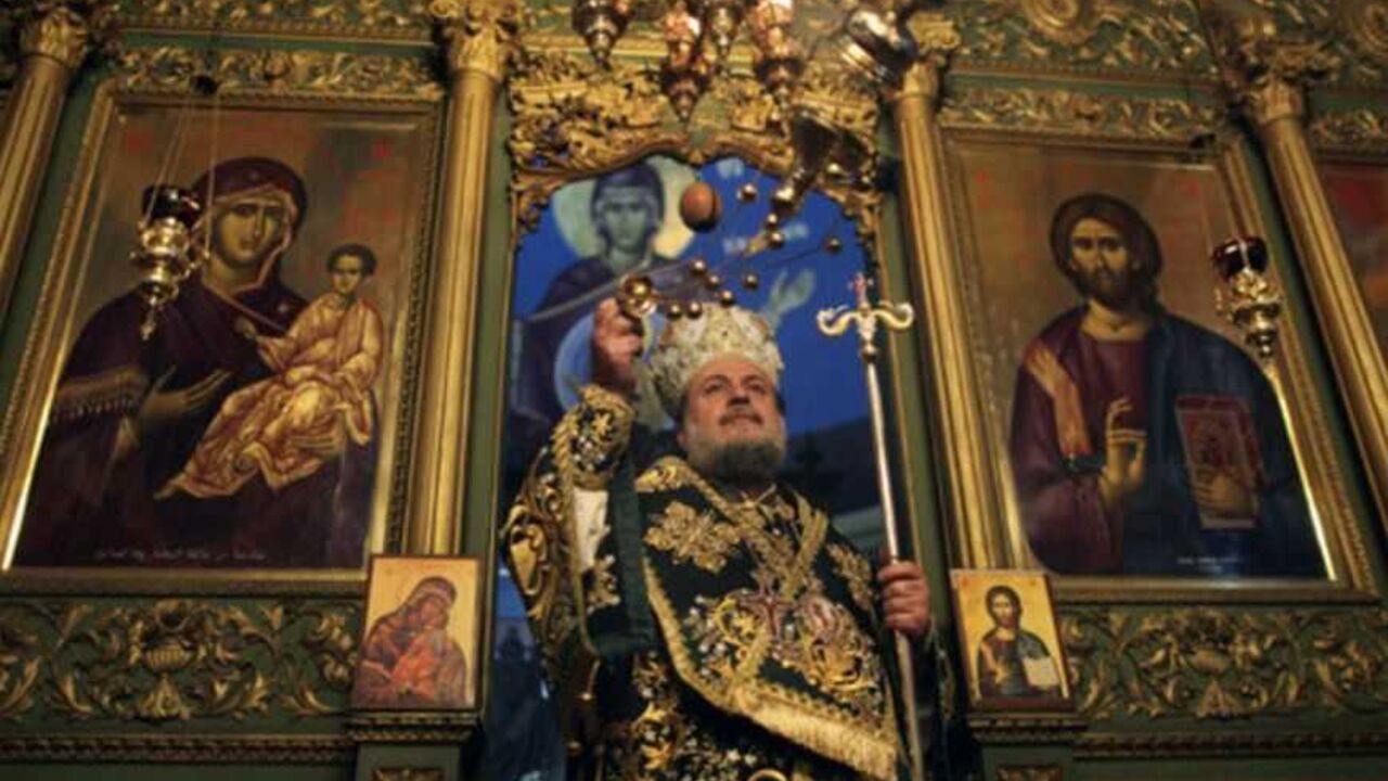 A Greek Orthodox priest attends Christmas services at the Saint Porfirios church in Gaza City A Greek Orthodox priest attends Christmas services at the Saint Porfirios church in Gaza City January 7, 2012. REUTERS/Mohammed Salem (GAZA - Tags: RELIGION) - RTR2VZBO