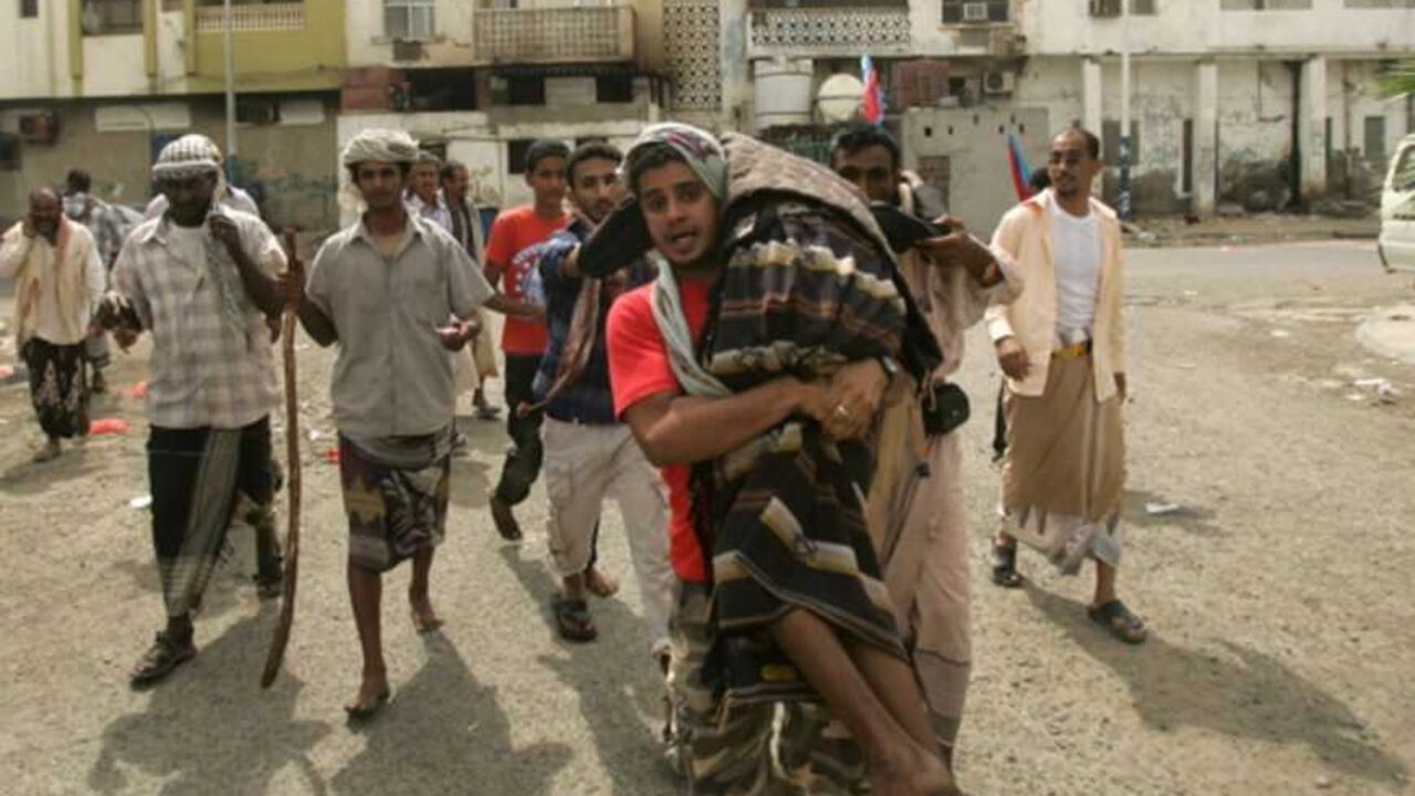 Supporter of the separatist Southern Movement is carried to an ambulance after he was injured during clashes with security forces in Aden A supporter of the separatist Southern Movement is carried to an ambulance after he was injured during clashes with security forces in the southern Yemeni port city of Aden February 21, 2013, ahead of planned rallies to mark the first anniversary of ex-president Ali Abdullah Saleh's ouster. Yemen has struggled to restore normality since President Abd-Rabbu Mansour Hadi was elected in February 2012 following a year of protests that forced his predecessor Saleh to step down after 33 years in power. REUTERS/Kh