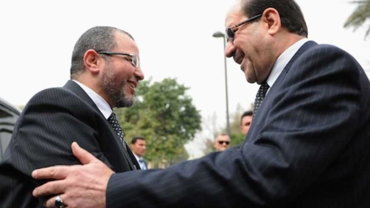 Iraq's PM al-Maliki welcomes Egypt's PM Qandil during his visit to Baghdad Iraq's Prime Minister Nuri al-Maliki (R) welcomes Egypt's Prime Minister Hisham Qandil during his visit to Baghdad, in this March 4, 2013 picture provided by Iraqi Prime Minister Media Office. REUTERS/Iraqi Prime Minister Media Office/Handout (IRAQ - Tags: POLITICS) ATTENTION EDITORS - THIS IMAGE WAS PROVIDED BY A THIRD PARTY. FOR EDITORIAL USE ONLY. NOT FOR SALE FOR MARKETING OR ADVERTISING CAMPAIGNS. THIS PICTURE IS DISTRIBUTED EXACTLY AS RECEIVED BY REUTERS, AS A SERVICE TO CLIENTS - RTR3EK27