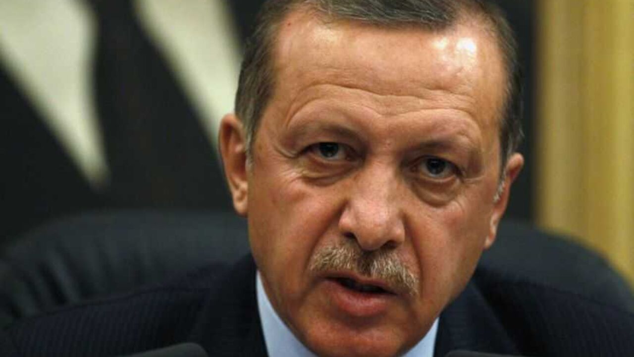 Turkey's Prime Minister Erdogan addresses media before his flight to Denmark for an official visit at Esenboga Airport in Ankara Turkey's Prime Minister Recep Tayyip Erdogan addresses the media before his flight to Denmark for an official visit at Esenboga Airport in Ankara March 19, 2013. REUTERS/Umit Bektas (TURKEY - Tags: POLITICS HEADSHOT) - RTR3F72K
