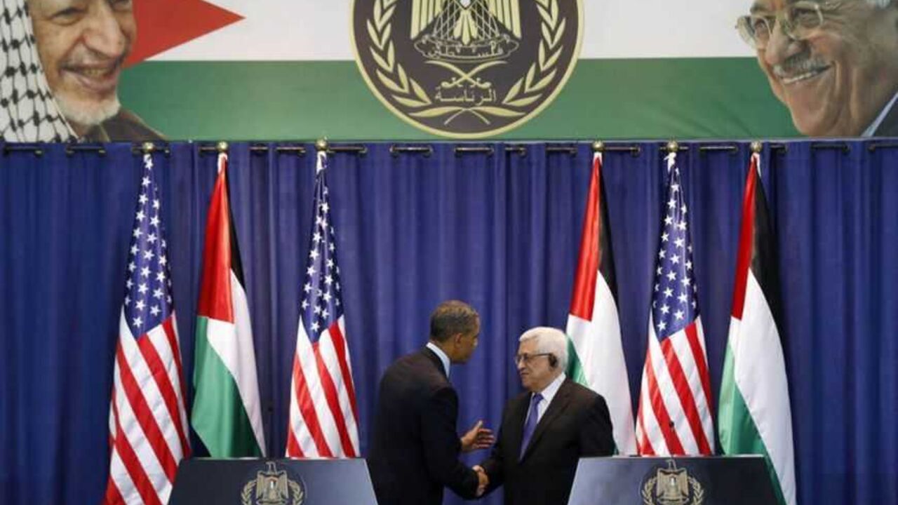 U.S. President Obama and Palestinian President Abbas shake hands at a news conference in Ramallah U.S. President Barack Obama and Palestinian President Mahmoud Abbas (R) shake hands at a news conference at the Muqata Presidential Compound in the West Bank City of Ramallah March 21, 2013. REUTERS/Larry Downing (WEST BANK - Tags: POLITICS) - RTR3F9ME