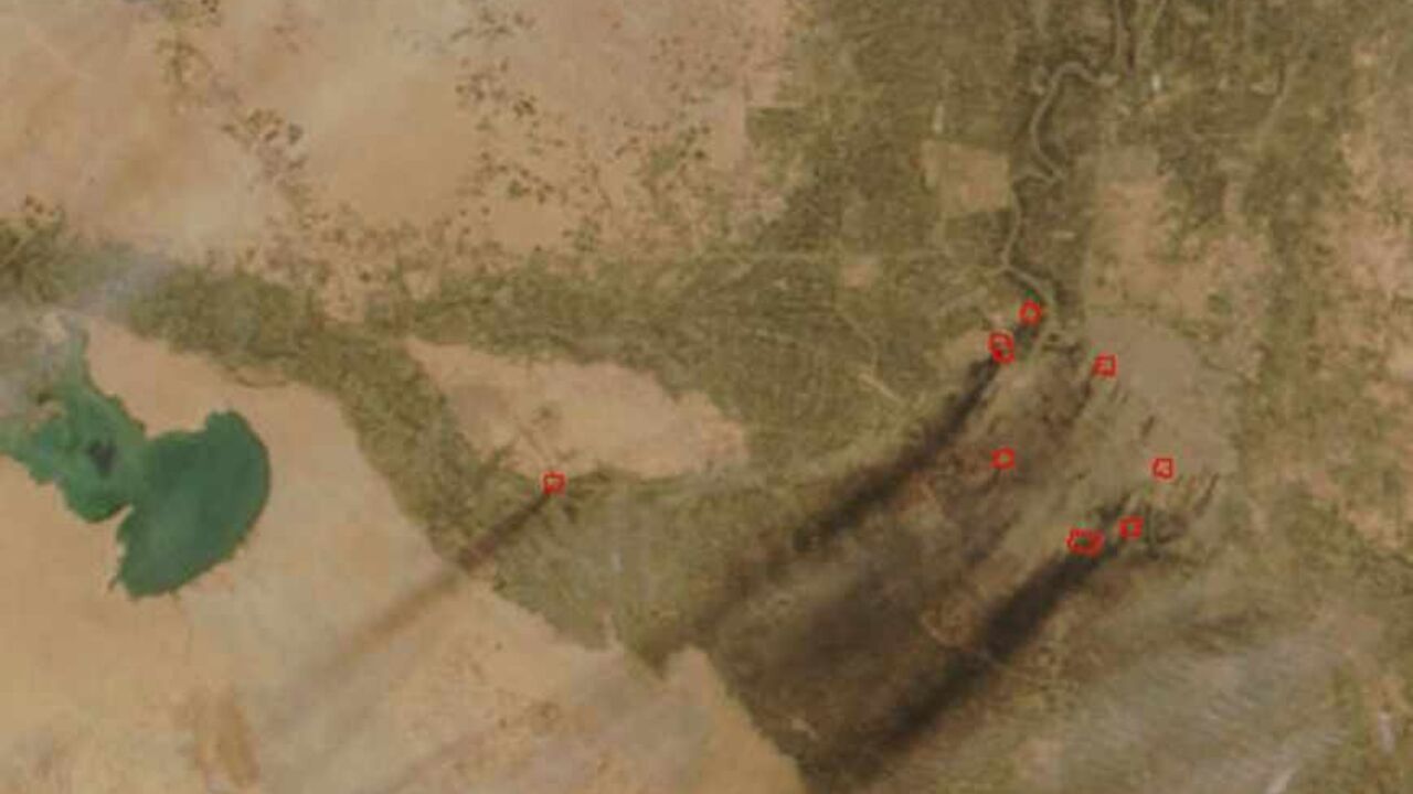Black Smoke Possibly From Oil Fires Visible In Baghdad IN SPACE - MARCH 31: This portion of a NASA handout satellite image of Baghdad, Iraq shows black smoke emanating from "hot spots" circled in red March 31, 2003. According to NASA the black plumes of smoke and there associated thermal anomalies or "hot spots," indicate that they are possibly oil fires. (Photo by NASA/MODIS/Getty Images)
