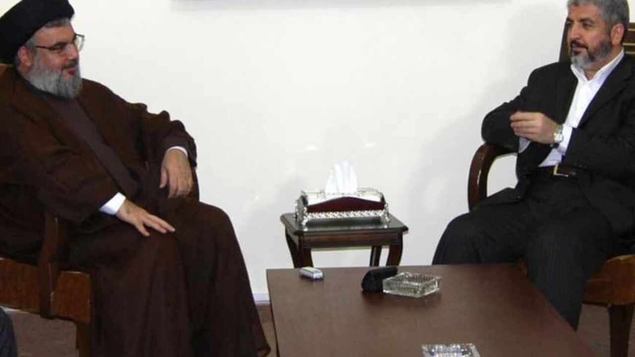 Lebanon's Hezbollah Leader Sayyed Hassan Nasrallah meets with Hamas leader Khaled Meshaal in Beirut Lebanon's Hezbollah Leader Sayyed Hassan Nasrallah (center, L) meets with Hamas leader Khaled Meshaal (center, R) in Beirut in this photo released in July 12, 2010. Hamas leader Meshaal visited Lebanon to pay his condolences for Grand Ayatollah Sayyed Mohammed Hussein Fadlallah who died last week. REUTERS/Lebanon's Hezbollah Media office/Handout (LEBANON - Tags: POLITICS OBITUARY) FOR EDITORIAL USE ONLY. NOT FOR SALE FOR MARKETING OR ADVERTISING CAMPAIGNS - RTR2GCPX