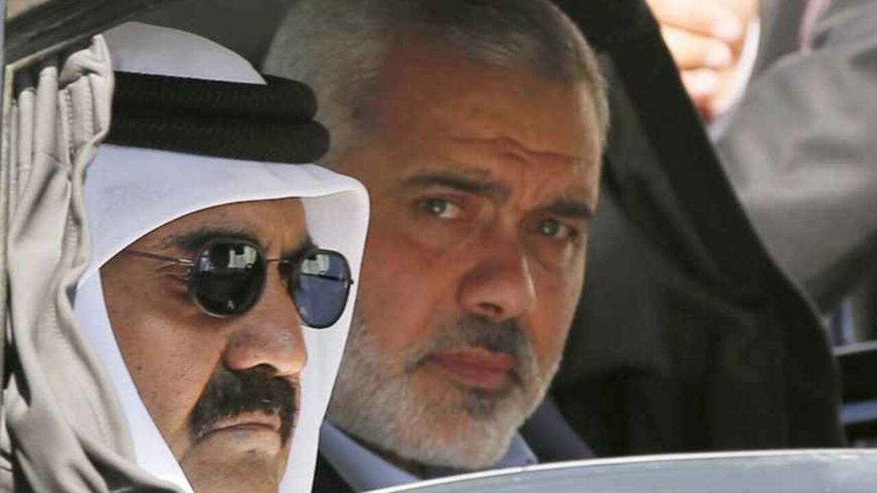 Hamas Prime Minister Haniyeh and the Emir of Qatar arrive at a cornerstone laying ceremony in Khan Younis Hamas Prime Minister Ismail Haniyeh (R) and the Emir of Qatar Sheikh Hamad bin Khalifa al-Thani arrive at a cornerstone laying ceremony for Hamad, a new residential neighbourhood in Khan Younis in the southern Gaza Strip October 23, 2012. The Emir of Qatar embraced the Hamas leadership of Gaza on Tuesday with an official visit breaking the isolation of the militant Palestinian Islamist movement, to the dismay of Israel and rival, Western-backed Palestinian leaders in the West Bank. REUTERS/Mohammed Salem (G