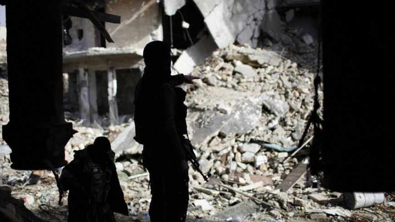 Members of Islamist Syrian rebel group Jabhat al-Nusra take their position on the front line during a fight with Syrian forces loyal to President Bashar al Assad in Aleppo Members of Islamist Syrian rebel group Jabhat al-Nusra take their position on the front line during a fight with Syrian forces loyal to President Bashar al Assad in Aleppo December 24, 2012. Syria special envoy Lakhdar Brahimi discussed solving the country's conflict with President Bashar al-Assad on Monday, but the opposition expressed deepening frustration with the mission following what it called the latest massacre of civilians. REUTERS/Ahmed Jadallah (SYRIA - Tags: CIVIL UNREST POLITICS CONFLICT) - RTR