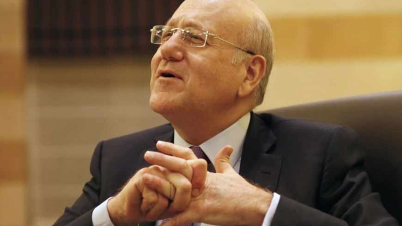 Lebanon's Prime Minister Najib Mikati talks at the Grand Serail, the government headquarters in Beirut Lebanon's Prime Minister Najib Mikati talks during an interview with Reuters at the Grand Serail, the government headquarters in Beirut March 12, 2013. Mikati urged Arab states to help Lebanon cope with a flood of Syrian refugees who are stretching its scarce resources and will need at least $370 million in support this year. Picture taken March 12, 2013. To match Interview SYRIA-CRISIS/LEBANON REUTERS/Jamal Saidi (LEBANON - Tags: POLITICS PROFILE) - RTR3EXH0