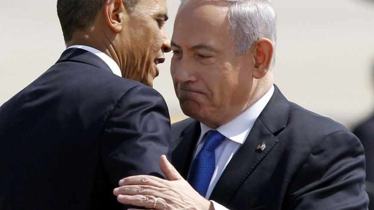 U.S. President Barack Obama hugs Israeli Prime Minister Benjamin Netanyahu at Ben Gurion International Airport Airport in Tel Aviv U.S. President Barack Obama hugs Israeli Prime Minister Benjamin Netanyahu at Ben Gurion International Airport Airport in Tel Aviv March 20, 2013. Obama said at the start of his first official visit to Israel on Wednesday that the U.S. commitment to the security of the Jewish state was rock solid and that peace must come to the Holy Land. REUTERS/Jason Reed (ISRAEL - Tags: POLITICS) - RTR3F8UU