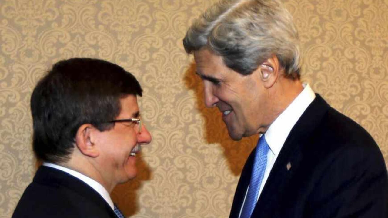 U.S. Secretary of State Kerry shakes hands with Turkey's Foreign Minister Davutoglu during their meeting in Istanbul U.S. Secretary of State John Kerry (R) shakes hands with Turkey's Foreign Minister Ahmet Davutoglu during their meeting at Ciragan Palace in Istanbul April 7, 2013. Kerry said on Sunday it was not up to Washington to set a deadline for Turkey and Israel to normalise ties but stressed the importance of restoring a full relationship between the two. REUTERS/Hakan Goktepe/Pool (TURKEY - Tags: POLITICS) - RTXYBQF