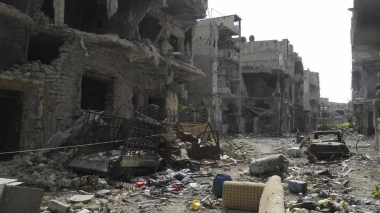 A view shows debris along a street of damaged buildings by what activists said was shelling by forces loyal to Syria's President Bashar al-Assad in Homs A view shows debris along a street of damaged buildings by what activists said was shelling by forces loyal to Syria's President Bashar al-Assad in Homs April 8, 2013. Picture taken April 8, 2013. REUTERS/Thair al-Khalidi/Shaam News Network/Handout (SYRIA - Tags: CONFLICT CIVIL UNREST) ATTENTION EDITORS - THIS PICTURE WAS PROVIDED BY A THIRD PARTY. REUTERS IS UNABLE TO INDEPENDENTLY VERIFY THE AUTHENTICITY, CONTENT, LOCATION OR DATE OF THIS IMAGE. FOR EDITORIAL USE ONLY. NOT FOR SALE FOR MARKETING OR ADVER