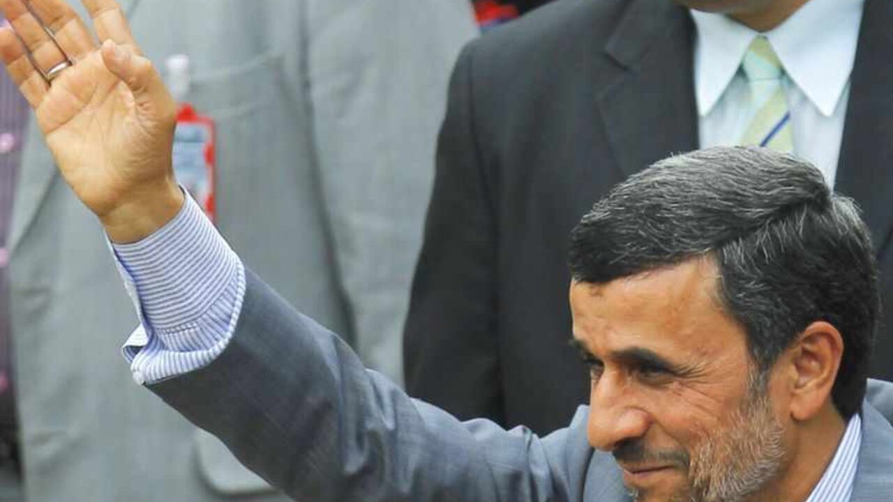 Iran's President Ahmadinejad waves during a ceremony to swear Venezuela's President Maduro into office, in Caracas Iran's President Mahmoud Ahmadinejad waves to supporters during a ceremony to swear Venezuela's President Nicolas Maduro (not pictured) into office, in Caracas April 19, 2013. Maduro was sworn in as Venezuela's president on Friday at a ceremony attended by several countries' leaders, after a decision to widen an electronic audit of the vote took some of the heat out of a dispute over his election. REUTERS/Carlos Garcia Rawlins (VENEZUELA - Tags: POLITICS ELECTIONS) - RTXYSR0
