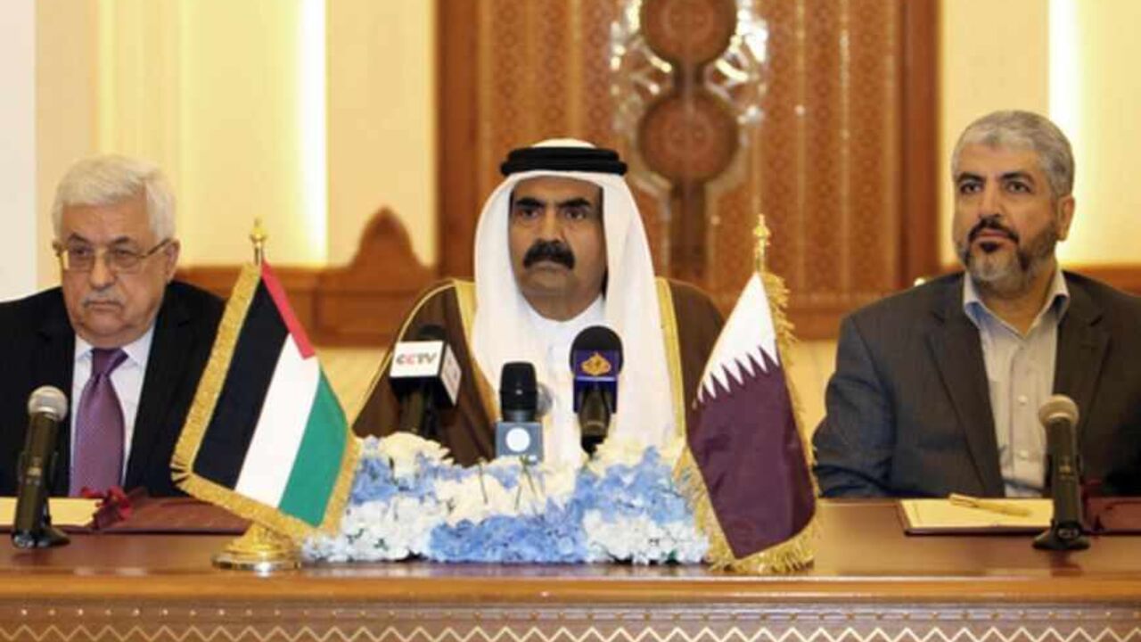 Nic6058035 Qatari Emir Sheikh Hamad Bin Khalifa Al-Thani (C) Palestinian President Mahmoud Abbas (L) and Hamas leader Khaled Meshaal attend a ceremony in Doha, on February 6, 2012. Abbas will head an interim national consensus government under a deal signed in Qatar between Abbas and Meshaal , ending a long-running disagreement that had stalled Palestinian reconciliation.
AFP PHOTO/STR (Photo credit should read -/AFP/Getty Images)