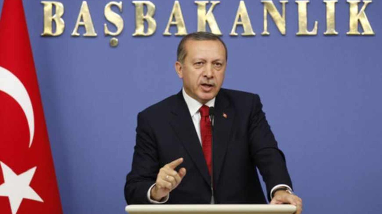 Turkey's Prime Minister Tayyip Erdogan speaks during a news conference in Ankara Turkey's Prime Minister Tayyip Erdogan speaks during a news conference in Ankara October 19, 2011. Turkish troops killed 15 Kurdish militants in clashes in southeast Turkey near the Iraqi border on Wednesday after attacks by the rebels which killed 26 soldiers, security officials in the region told Reuters. REUTERS/Umit Bektas (TURKEY - Tags: POLITICS CONFLICT) - RTR2SUBU