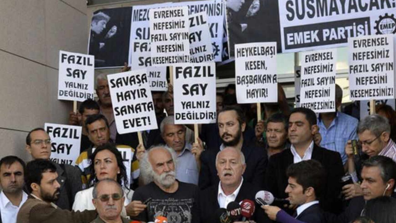 Supporters of Turkish classical pianist Fazil Say demonstrate in front of the court house in Istanbul Supporters of Turkish classical pianist Fazil Say demonstrate in front of the court house in Istanbul October 18, 2012. Internationally acclaimed Turkish classical pianist Fazil Say goes on trial on charges of insulting Muslim religious values in comments posted on Twitter. REUTERS/Burak Akbulut/Anadolu Agency (TURKEY - Tags: POLITICS CIVIL UNREST CRIME LAW) FOR EDITORIAL USE ONLY. NOT FOR SALE FOR MARKETING OR ADVERTISING CAMPAIGNS. THIS IMAGE HAS BEEN SUPPLIED BY A THIRD PARTY. IT IS DISTRIBUTED, EXACTLY